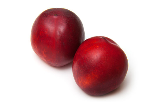 .Nectarines isolated on a white studio background.