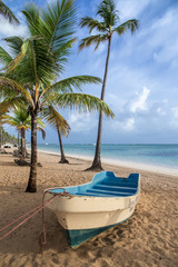 Plakat boat on sandy Tropical Caribbean beach