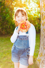 Outdoor portrait of a cute little girl