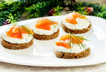 canape with salmon and cream cheese with dill