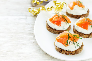canape with salmon and cream cheese with dill