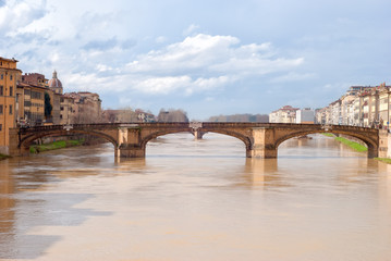 Fototapeta premium Santa Trinita bridge over the Arno river in Florence, Italy
