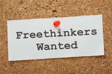 The phrase Freethinkers Wanted on a cork notice board