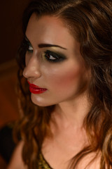 Fototapeta premium Portrait of beautiful young woman with bright make-up