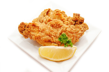 Served Fried Chicken with a Lemon Wedge