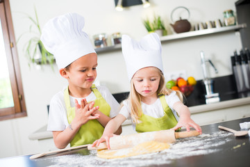 happy children kids family preparing funny cake kitchen at home