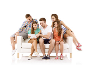 Obraz premium Group of young people on sofa with tablet