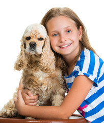 Pretty smiling girl with american spaniel