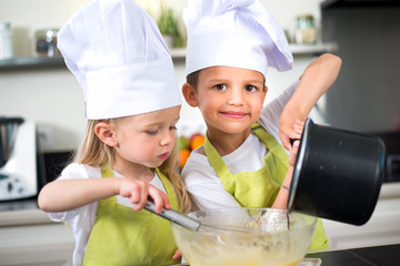 happy childrens kids family preparing funny cake kitchen at home