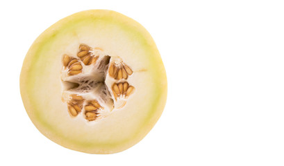 Slice of honeydew fruit over white background 