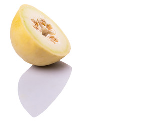Slice of honeydew fruit over white background 