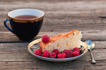 pie with raspberry on the wooden backgraund