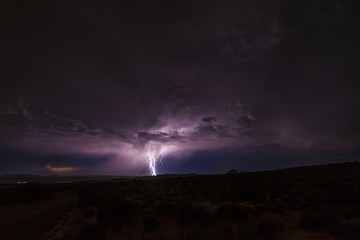 Naklejka na ściany i meble Lightning Strike at night in Canyonlands