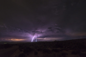 Naklejka na ściany i meble Lightning Strike at night in Canyonlands