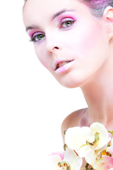 Beautiful girl, on white, with pink orchids, emotions, cosmetics