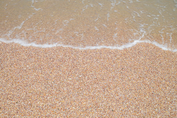 Beach sand background. Wave and sand border.