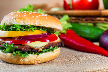 homemade hamburger with fresh vegetables, close up