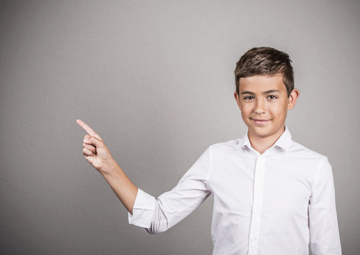 Portrait Young man pointing presenting copy space advertisement 