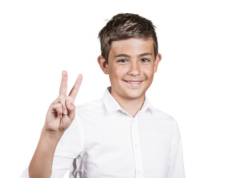 Young man showing number two sign, peace gesture