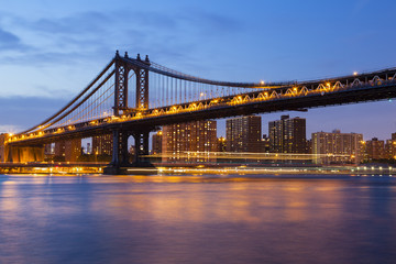 Manhattan Bridge and Skyline At Night