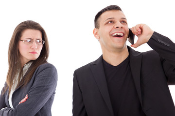jealous suspicious woman looking at unfaithful man talking with