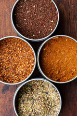 Spice in round bowls: merquen, Za'atar, Ras el hanout,dukkah