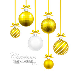 Christmas balls with yellow ribbon and bows