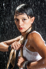 Happy girl with rain and transparent umbrella