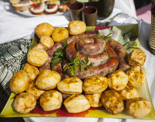 grilled meat sausages with potatoes