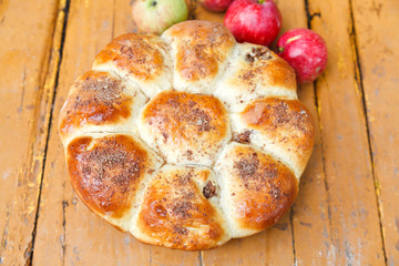 baked closed apple pie and fruits
