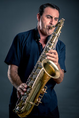 Fototapeta na wymiar musician with saxophone