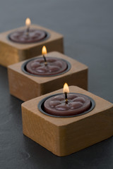 Three small candles in row