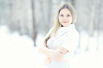 Obraz premium blonde in white dress snow high key