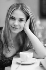 portrait of young woman in black and white