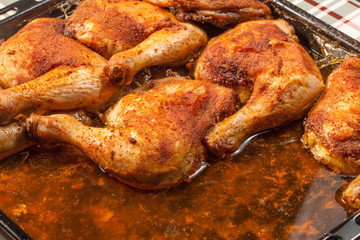 Fried chicken legs in deep fat. Selective focus.