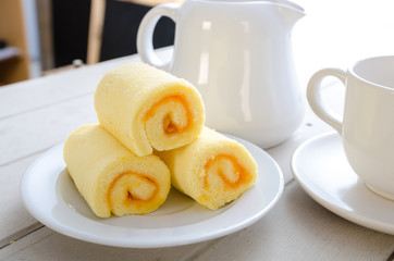 Roll cake on food table