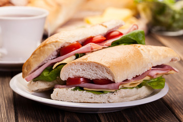 Panini sandwich with ham, cheese and tomato