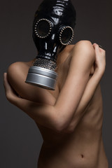 Fototapeta premium Nude woman in exclusive gas mask