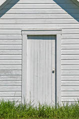 White Door in White Barn