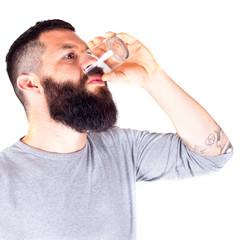 bearded man drinking