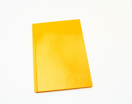 carnet bloc-note orange,isol&eacute; sur fond blanc