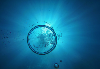 Ring and bubbles of air in water