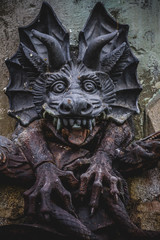 devil figure, bronze sculpture with demonic gargoyles and monste
