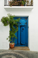 Fototapeta na wymiar Spanish village blue door