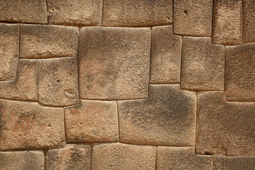 The multi-sided granite stones in ancient Inca wall street, Puno - obrazy, fototapety, plakaty