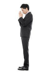 Businessman praying.