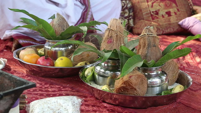 bride and groom perform the rite next to the accessories that ar