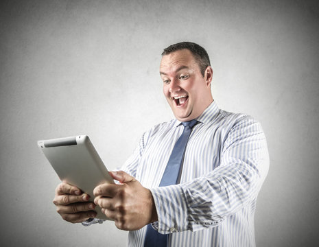excited businessman by reading good news