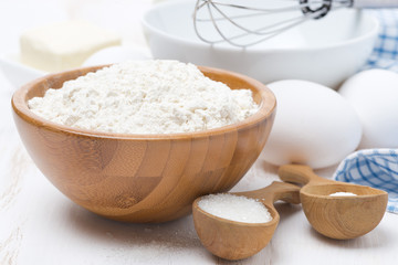 Fototapeta na wymiar flour, salt, sugar and eggs for baking pancakes, close-up