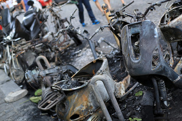 Burnt bikes and scooter after a fire, accident